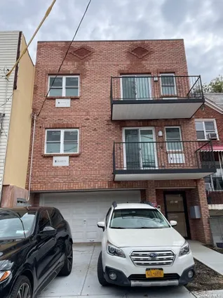 Homes for sale in Sunnyside | View 48-21 39th Street | 6 Beds, 5 Baths