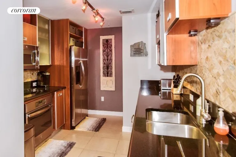 New York City Real Estate | View 410 Evernia Street #418 | Spacious, Modern Galley Kitchen | View 11