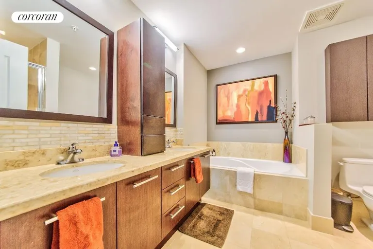 New York City Real Estate | View 410 Evernia Street #418 | Master Bathroom | View 17