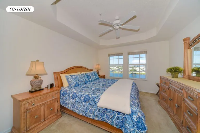 New York City Real Estate | View 4408 Tuscany Way | Spacious Master Bedroom Overlooks Intracoastal | View 15