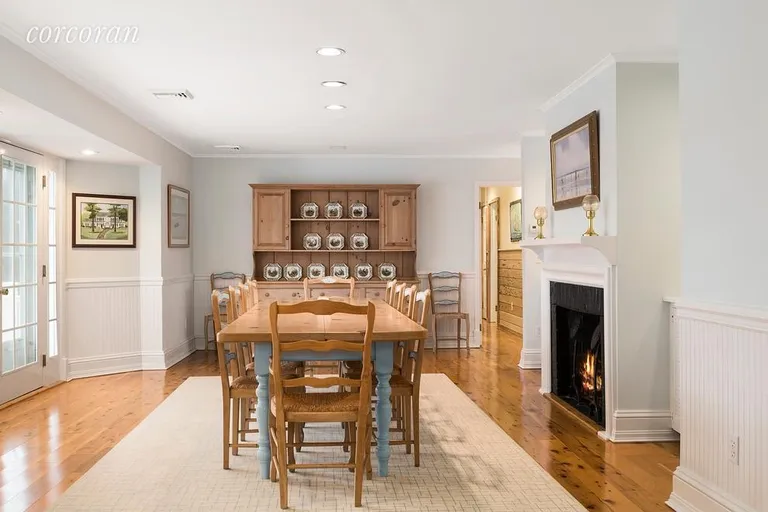 New York City Real Estate | View 71 Bayfield Lane | Dining Room with Fireplace | View 5