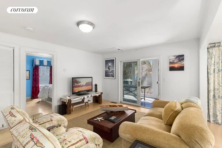 New York City Real Estate | View  | Living room with screen porch beyond | View 4