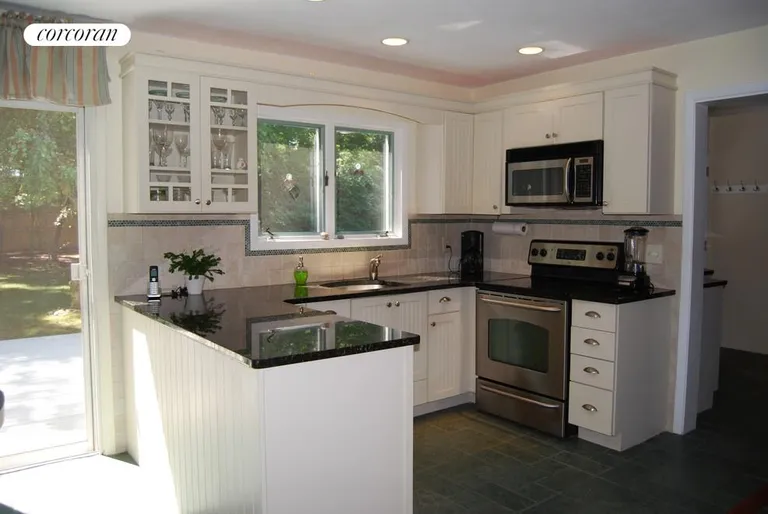 New York City Real Estate | View  | Sunny Kitchen Leading to Deck | View 3