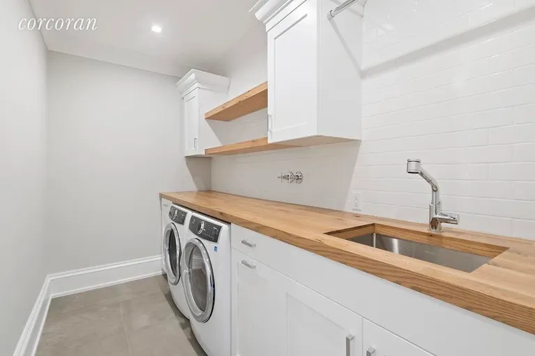 New York City Real Estate | View 419 Little Noyac Path | laundry room | View 20