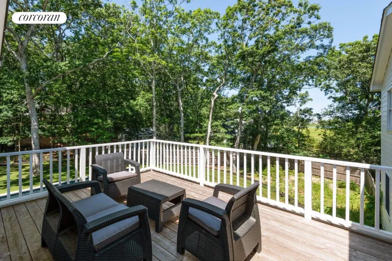 New York City Real Estate | View 62 Turtle Cove Drive | Upstairs Balcony With Some Water Views | View 24