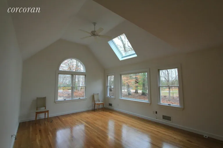 New York City Real Estate | View 264 Big Fresh Pond Rd | Living room with vaulted ceilings and skylight | View 4