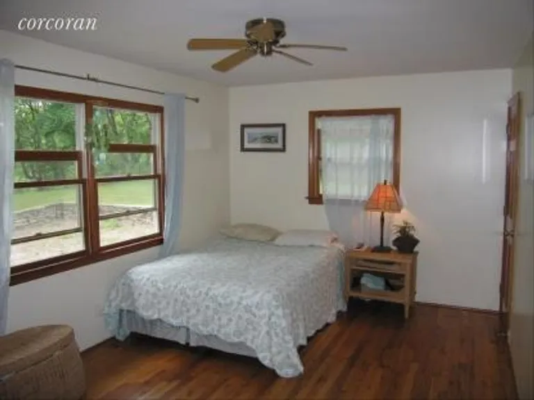 New York City Real Estate | View 26 Rocky Point Road | Master Bedroom with Bath | View 10