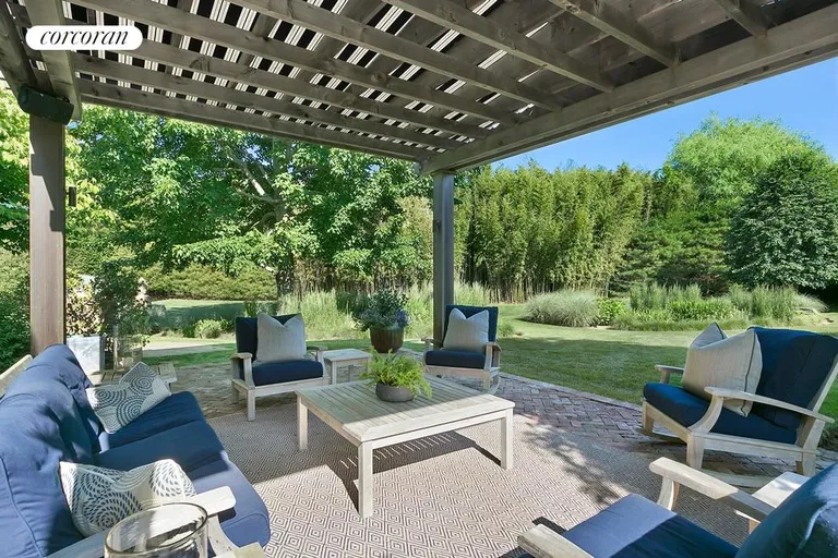 New York City Real Estate | View  | Relax and enjoy the gardens from this covered patio | View 13
