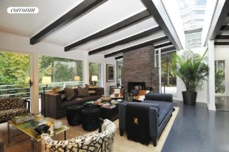 New York City Real Estate | View  | Living room with wood-burning fireplace | View 5