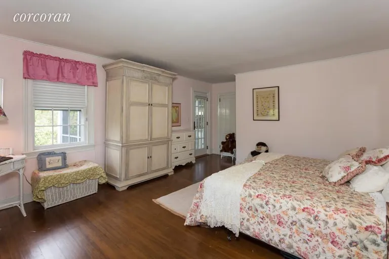 New York City Real Estate | View 34 Stevens Lane | Bedroom with Porch | View 15