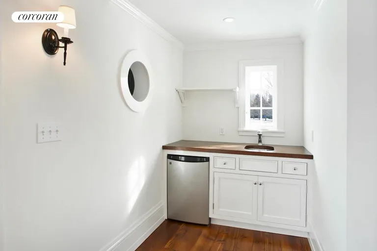 New York City Real Estate | View  | Pool House Wet Bar with Counter Space and Fridge | View 21