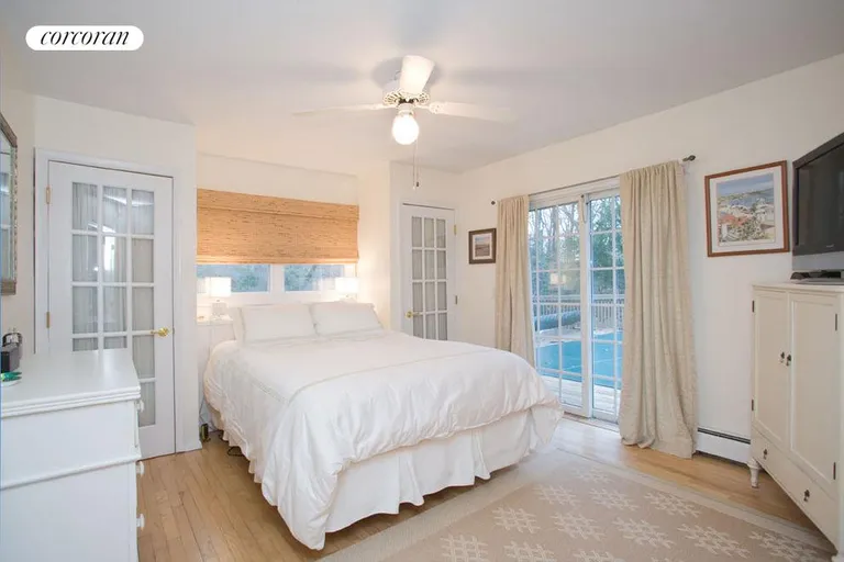 New York City Real Estate | View  | Master bedroom with sliders to pool | View 7