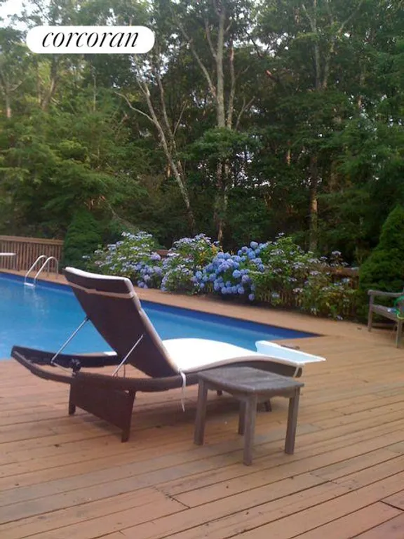 New York City Real Estate | View  | Relaxing lounge by the pool, garden in full bloom | View 18