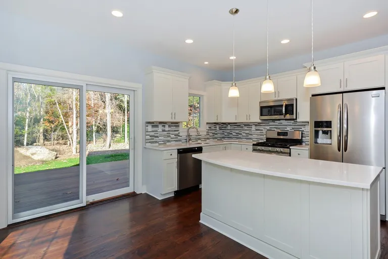 New York City Real Estate | View  | Open plan kitchen leads to mahogany deck and backyard | View 3