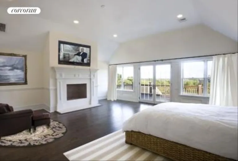 New York City Real Estate | View  | master bedroom with fireplace and private deck | View 14