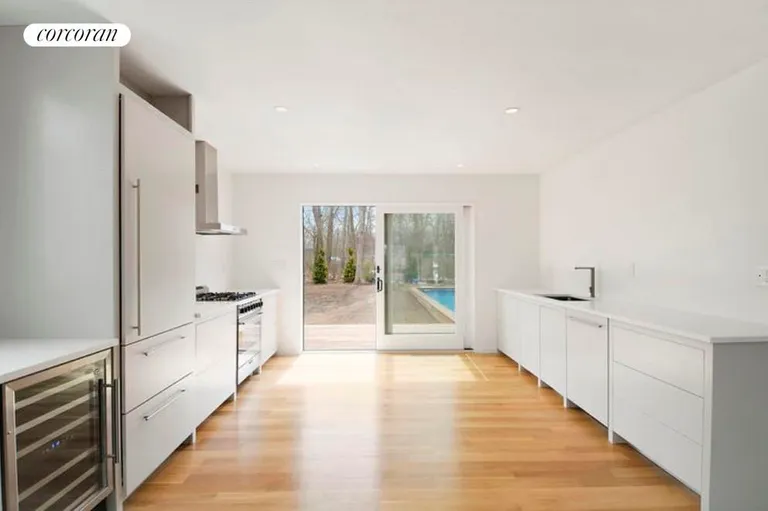 New York City Real Estate | View  | modern kitchen access to rear deck | View 6