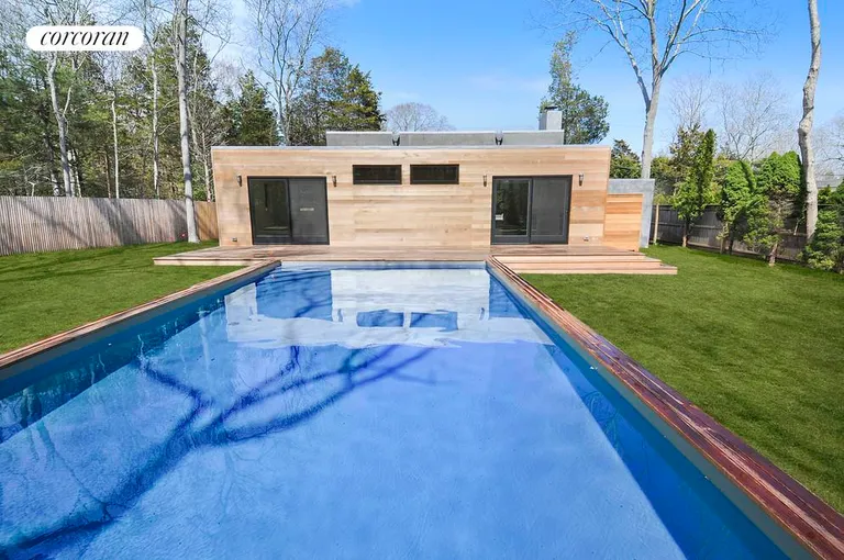 New York City Real Estate | View  | rear deck with heated pool set in open lawn | View 8