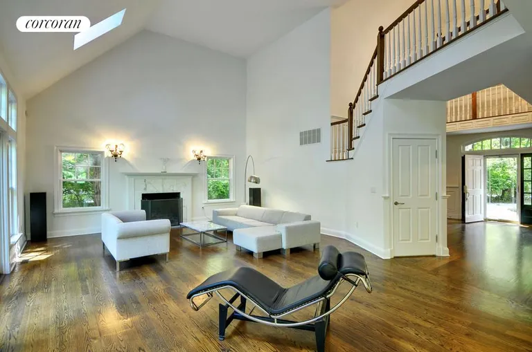 New York City Real Estate | View  | Two-Story Living Room with Fireplace | View 3