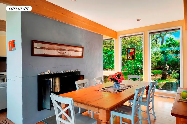 New York City Real Estate | View  | dining area with lake views and fireplace | View 6