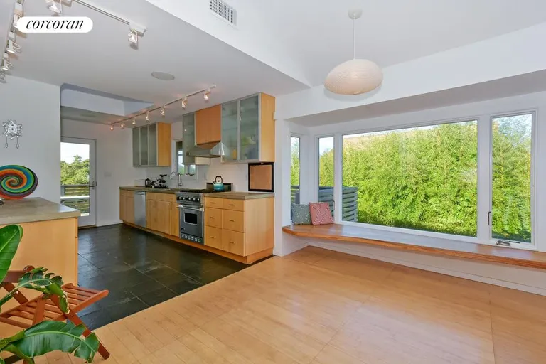 New York City Real Estate | View  | kitchen area with custom built in bench | View 3