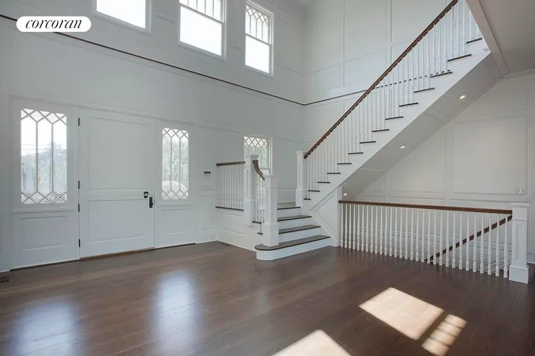 New York City Real Estate | View  | double heigh entry foyer with custom built raised paneled walls | View 3