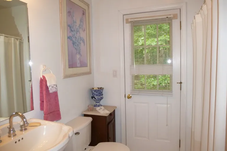 New York City Real Estate | View 163 Talmage Farm Lane | Bathroom with Outside Entrance | View 16