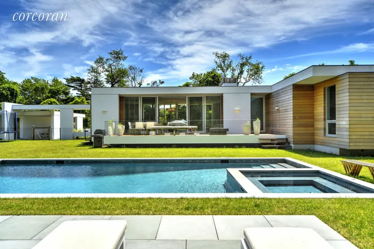 New York City Real Estate | View 112 Sunset Beach Rd | Rear exterior and heated gunite pool | View 19