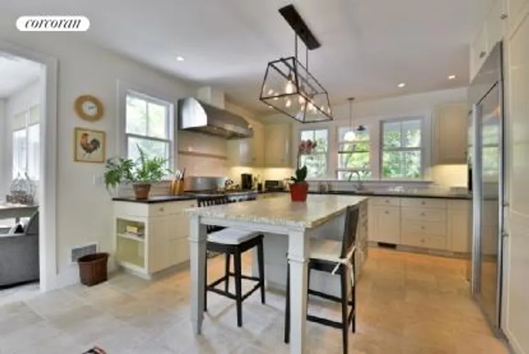 New York City Real Estate | View  | Eat in kitchen opens to sunroom and the beautiful back yard | View 4