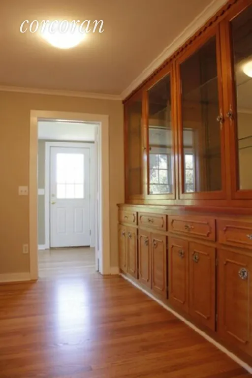 New York City Real Estate | View 4735 Cox Ln | Beautifully Restored Hallway w/Built in Cabinetry | View 5