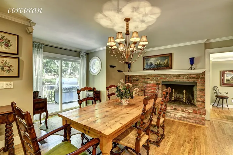 New York City Real Estate | View 53 Wickatuck Lane | Dining Area with Wood Burning Fireplace | View 9