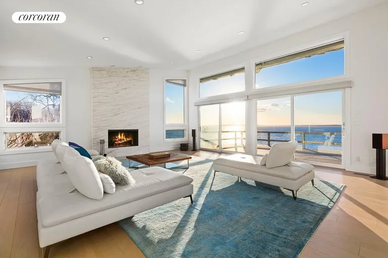 New York City Real Estate | View  | Open floor plan with panoramic views and fireplace | View 5