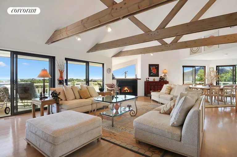 New York City Real Estate | View  | great room with fireplace & ocean views | View 7