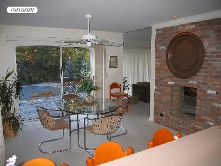New York City Real Estate | View  | Dining Area with Brick Fireplace | View 7