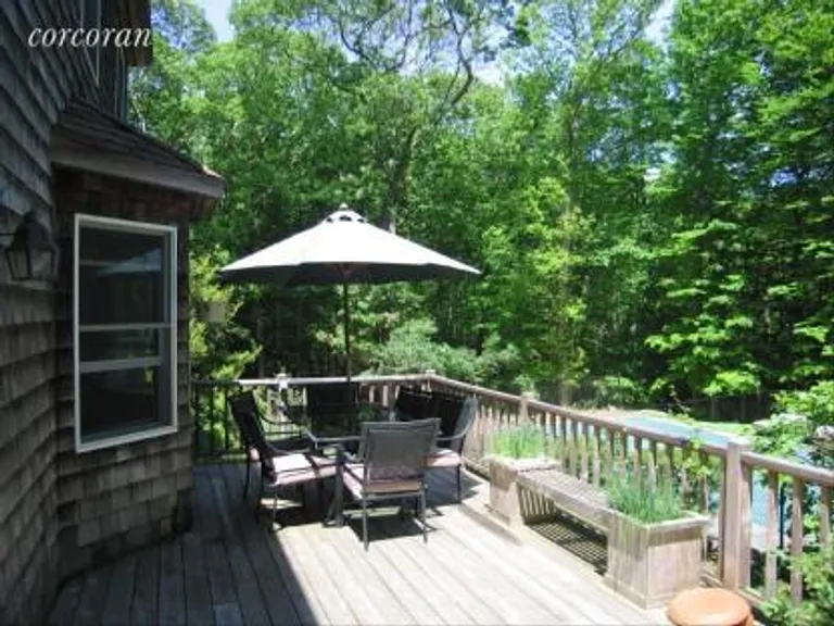 New York City Real Estate | View 7 Quail Run | Rear Deck overlooking pool and Preserve | View 13