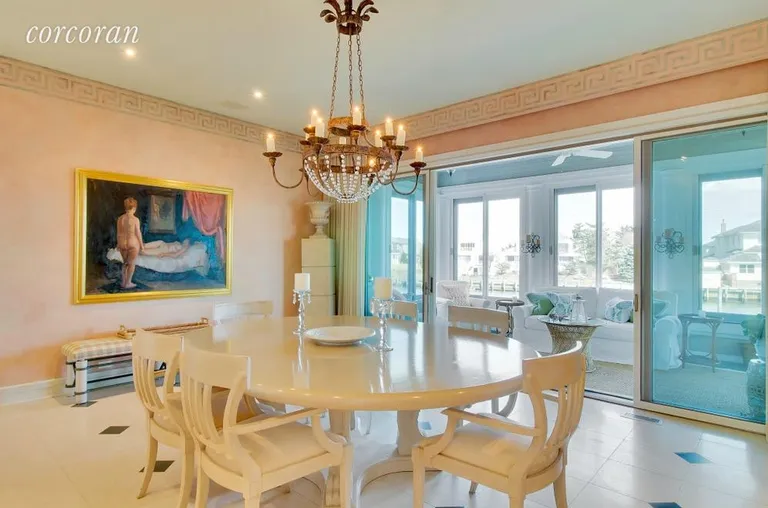 New York City Real Estate | View 24 Stacy Drive | Dining room with slider to porch | View 15
