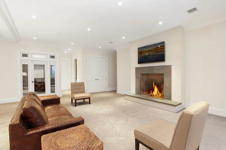 New York City Real Estate | View  | Lower Level Living Room With Fireplace | View 18