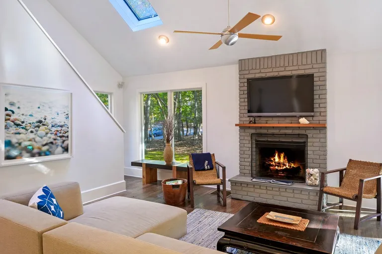 New York City Real Estate | View  | skylights and a fireplace makes this a comfortable space in all seasons | View 5