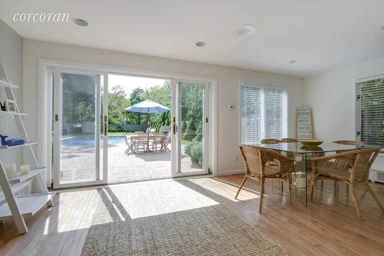 New York City Real Estate | View 75 Mill Road | Dining Room Overlooking Pool | View 12