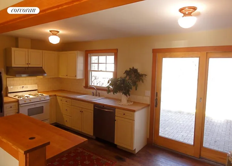 New York City Real Estate | View  | Kitchen w/ Doors to Patio | View 4