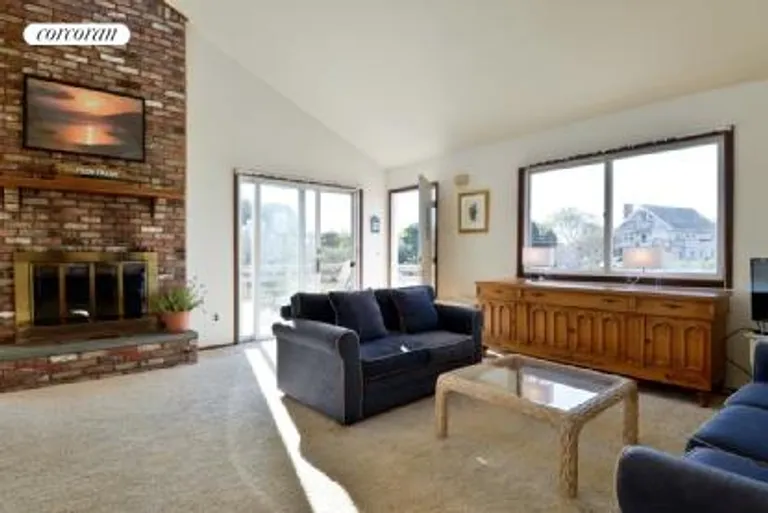New York City Real Estate | View  | living area with brick fireplace | View 2
