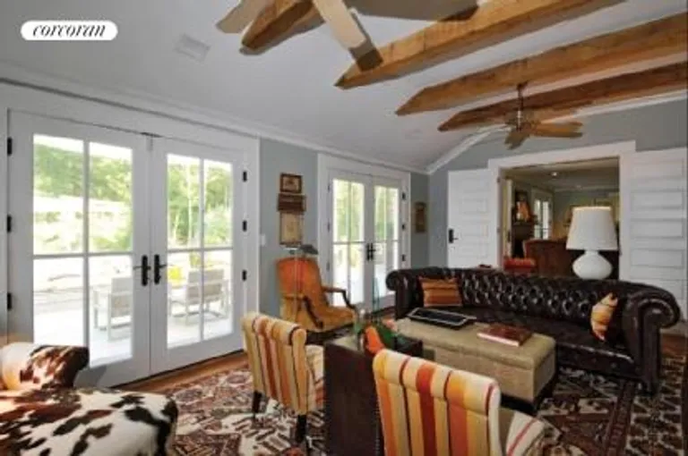 New York City Real Estate | View  | Family room with fireplace and exposed beams | View 6