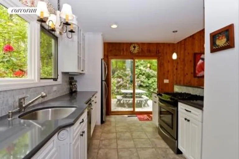 New York City Real Estate | View  | kitchen opening onto deck | View 7