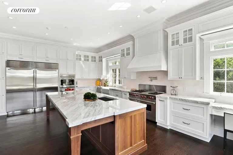 New York City Real Estate | View  | Grand chef's kitchen with state of the art Wolf/Sub Zero applicances, custom crafted raised panel kitchen cabinets, and hand selected slabs of statuary stone | View 14