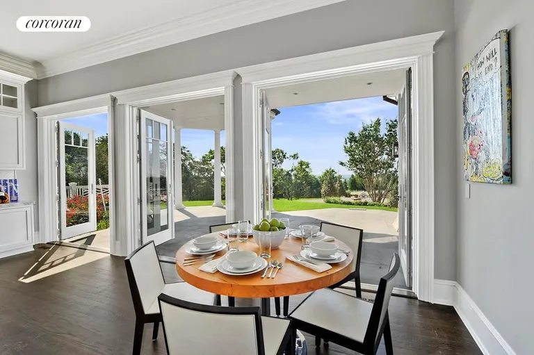 New York City Real Estate | View  | Breakfast area with double french doors, which lead to idealistic patio covered by second floor terrace | View 15
