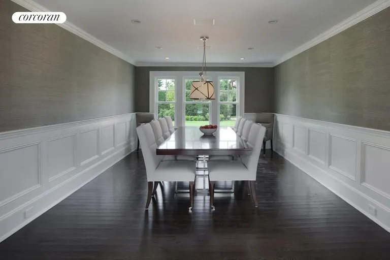 New York City Real Estate | View  | Formal Dining Room with Custom Paneling and Dramatic Lighting | View 13