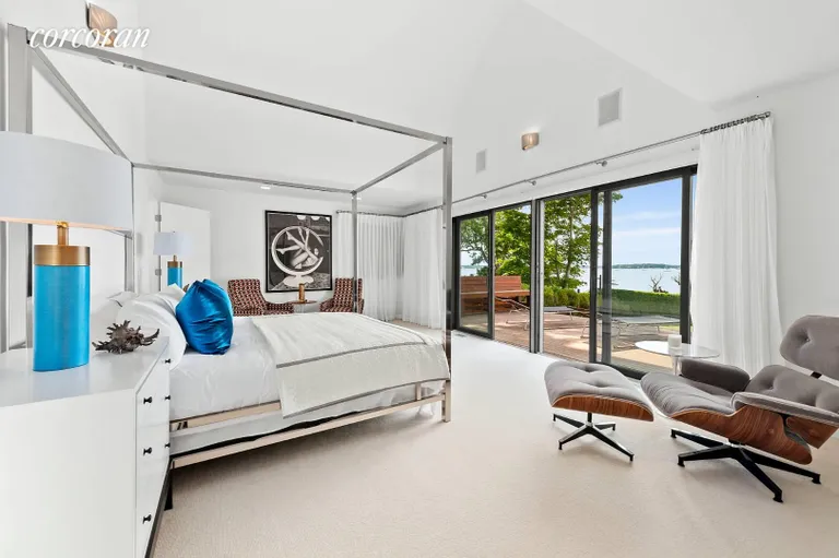 New York City Real Estate | View 18 Soundview Drive | Master Bedroom with Private Deck | View 7