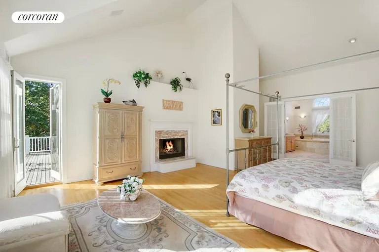 New York City Real Estate | View  | Master Bedroom with Gas Fireplace and Balcony | View 9