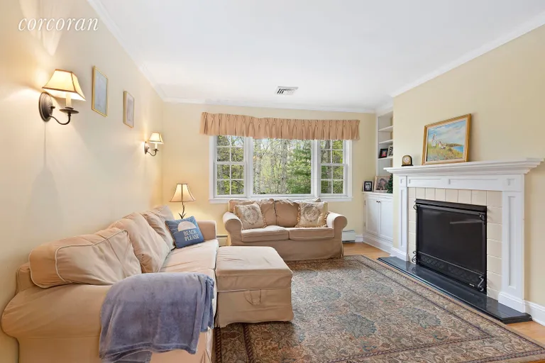 New York City Real Estate | View 41 Woodvale Street | Light-filled Living Room with Fireplace | View 3