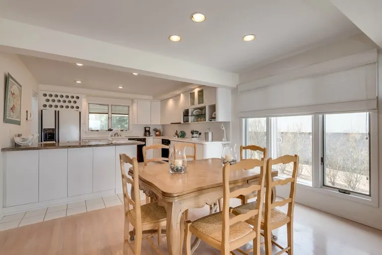 New York City Real Estate | View 392 Dune Road | dining area | View 7