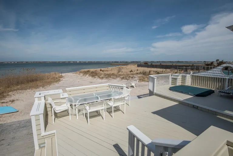 New York City Real Estate | View 392 Dune Road | tiered decks, jacuzzi hot tub | View 19